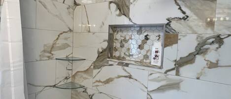Shower, towels, soap, shampoo