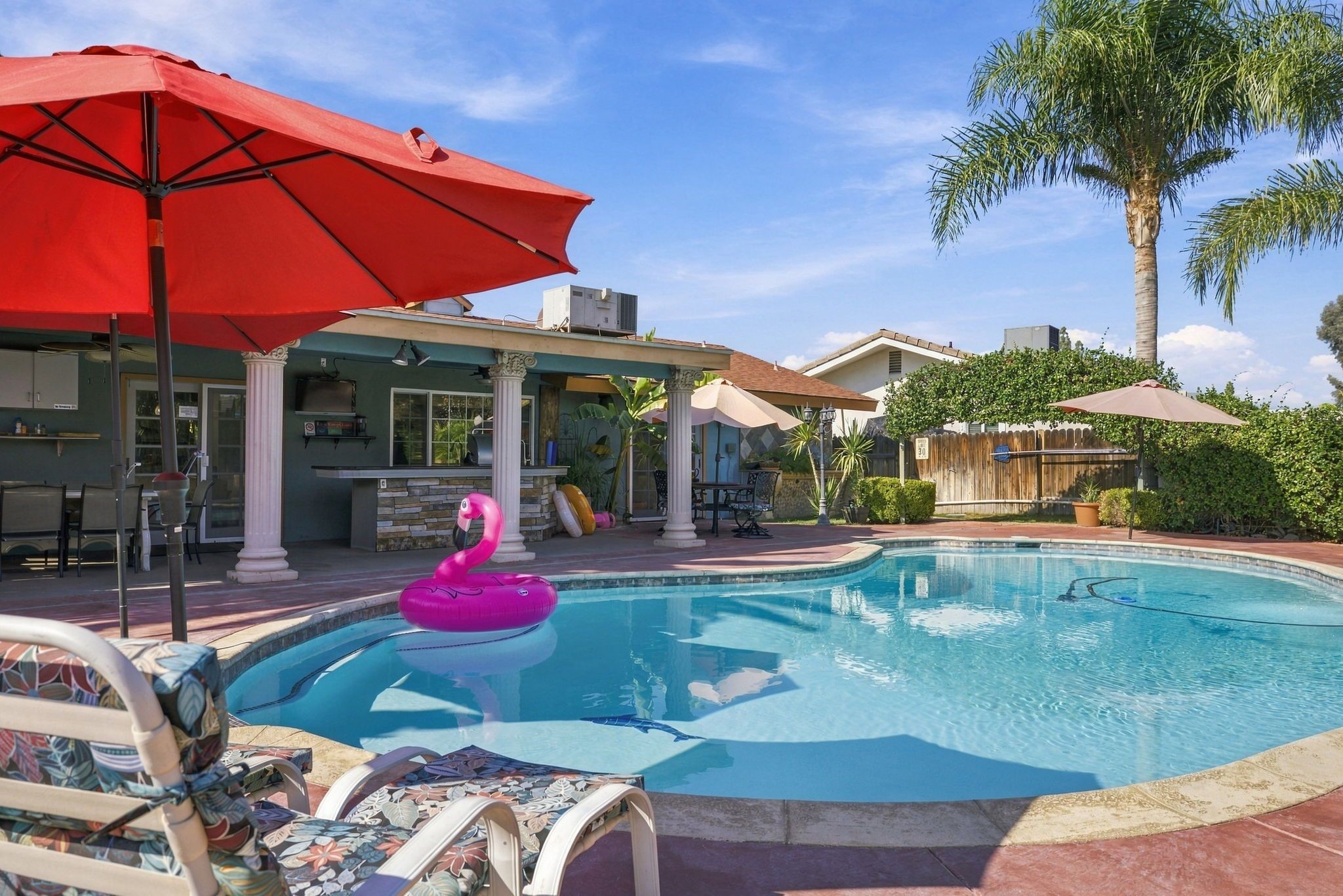 Enjoy the sparkling pool, soak up the sunshine, and take in the lush tropical greenery that makes Casa Tropical your perfect getaway.