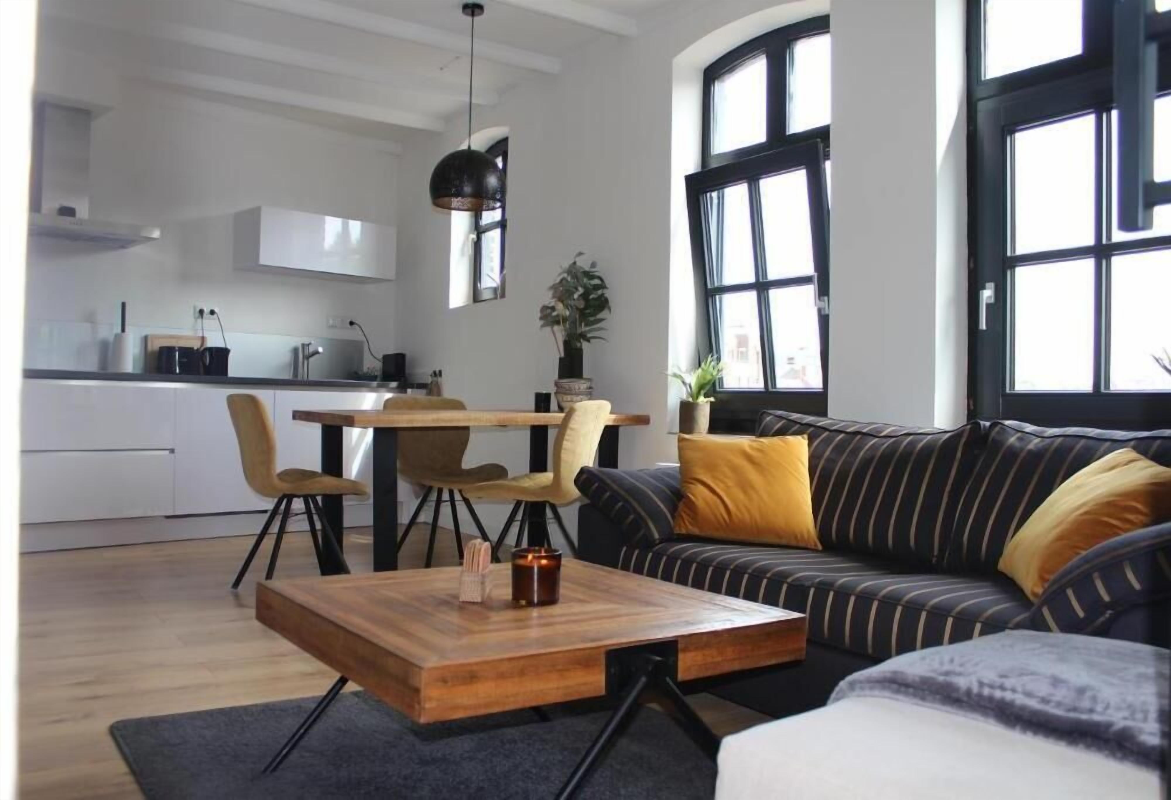 Deluxe-Apartment, Balkon, Seeblick | Wohnbereich