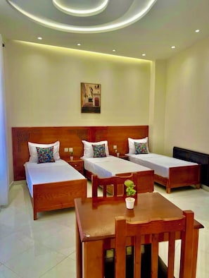 Standard Double or Twin Room | Desk, laptop workspace, blackout drapes, free WiFi