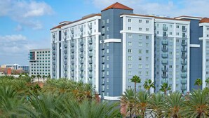 A multi-story residential building with balconies, a flat roof, and a modern architectural design. - Wyndham Large Luxury 2 Bedroom Suite w/Kitchen Next to Disneyland. Book by 6/29 (Anaheim)