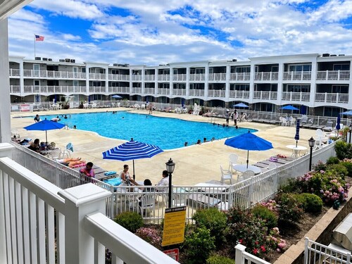 Ocean Club Getaway | 2BR & Parking, Exclusive Barrier Island Retreat