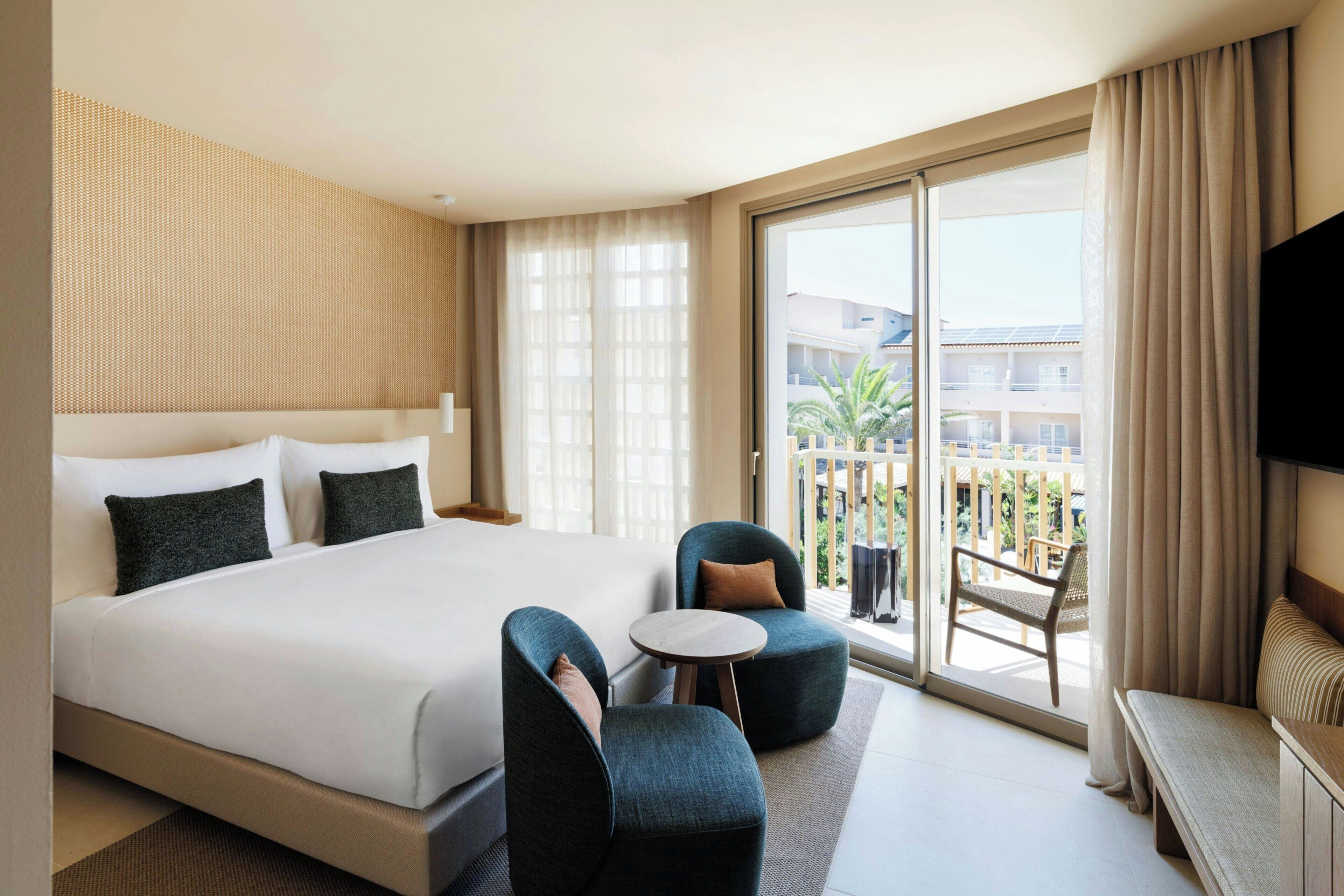 Habitación Deluxe, 1 cama de matrimonio grande, vistas parciales al mar | Wifi gratis