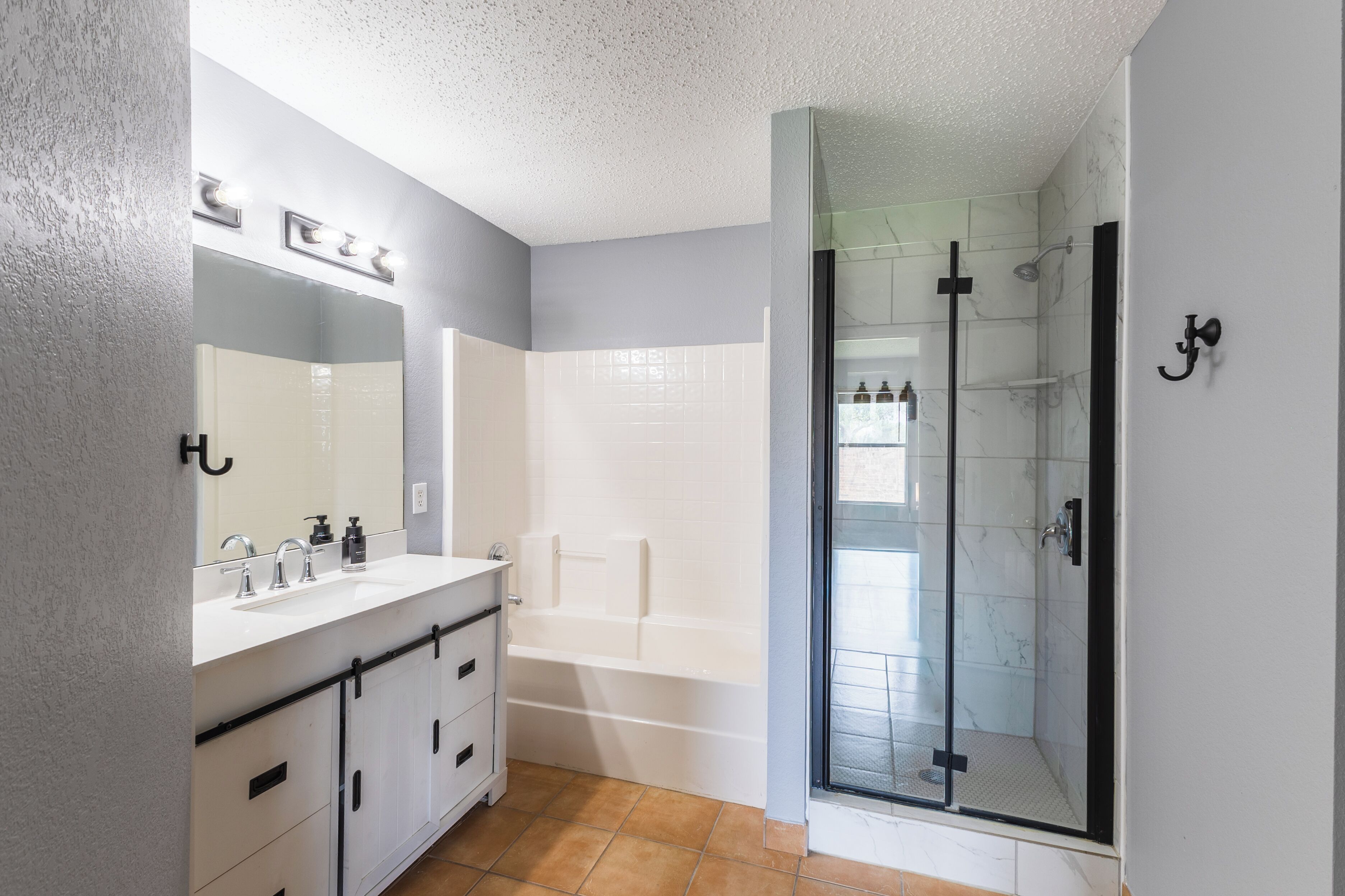 Hair dryer, towels, soap, toilet paper