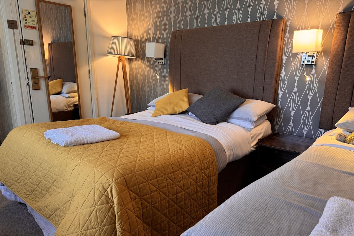 Triple Room, Private Bathroom, Garden View (3) | Iron/ironing board (on request), WiFi (free), bed sheets