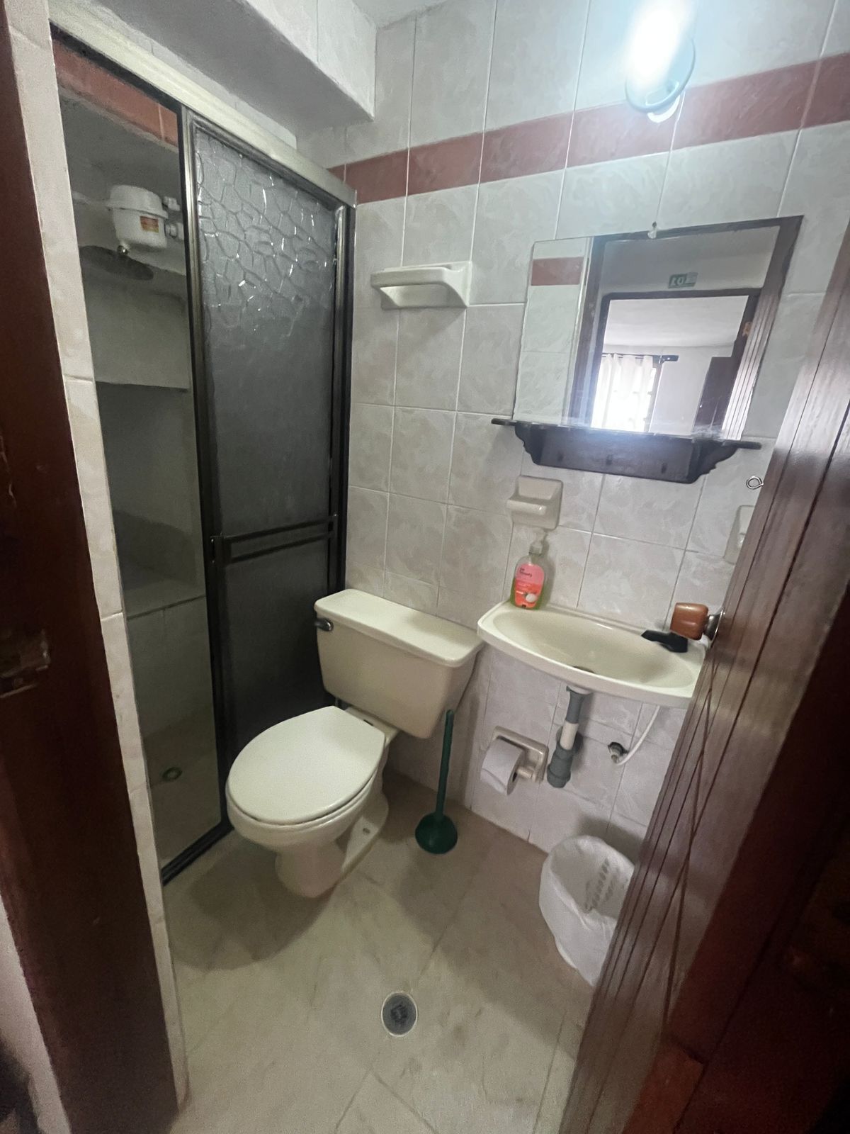 Shower, towels, soap, toilet paper