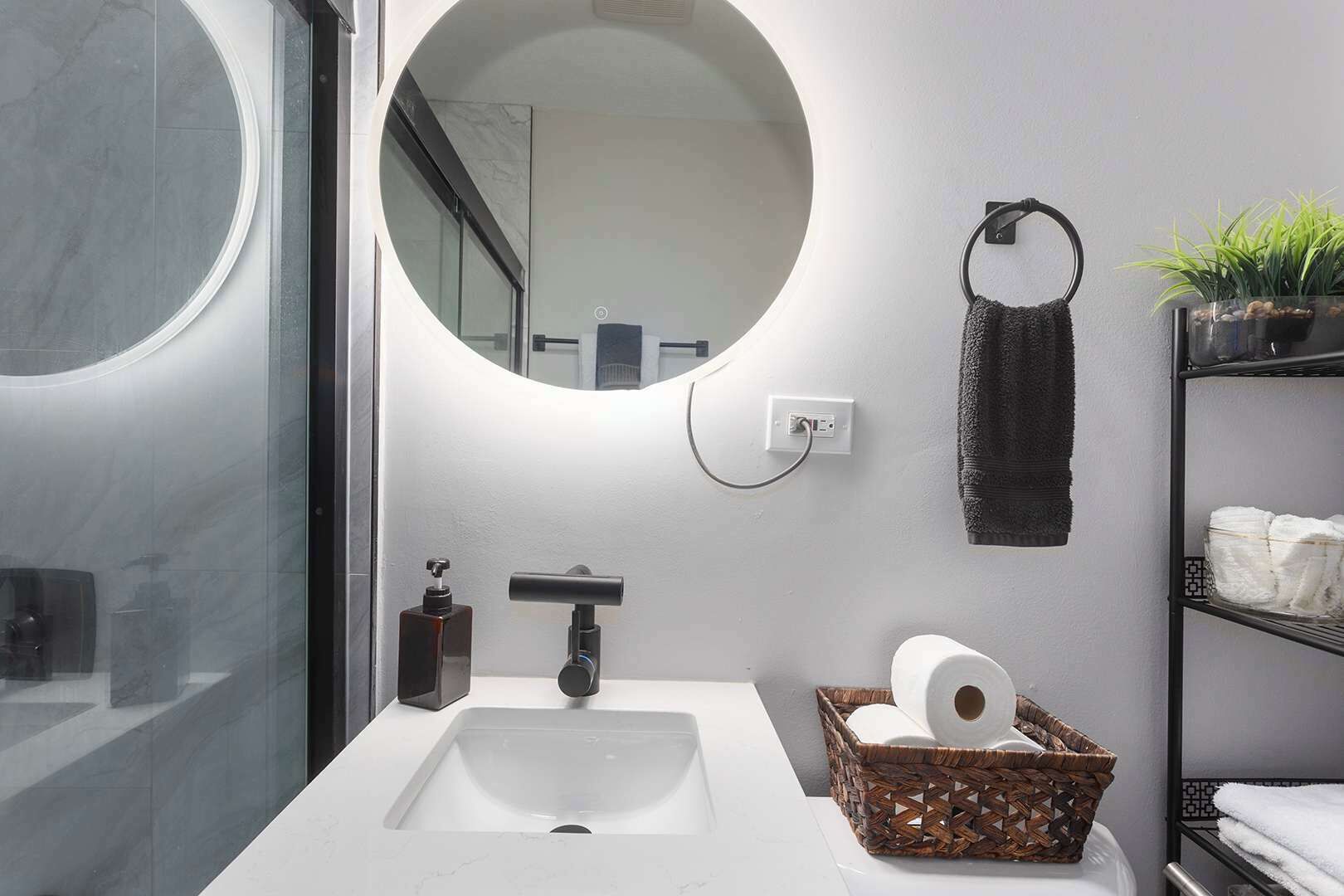 Shower, hair dryer, towels, shampoo