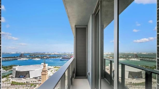 A balcony with a view of a marina and buildings. - 501 - 3508 (Miami)