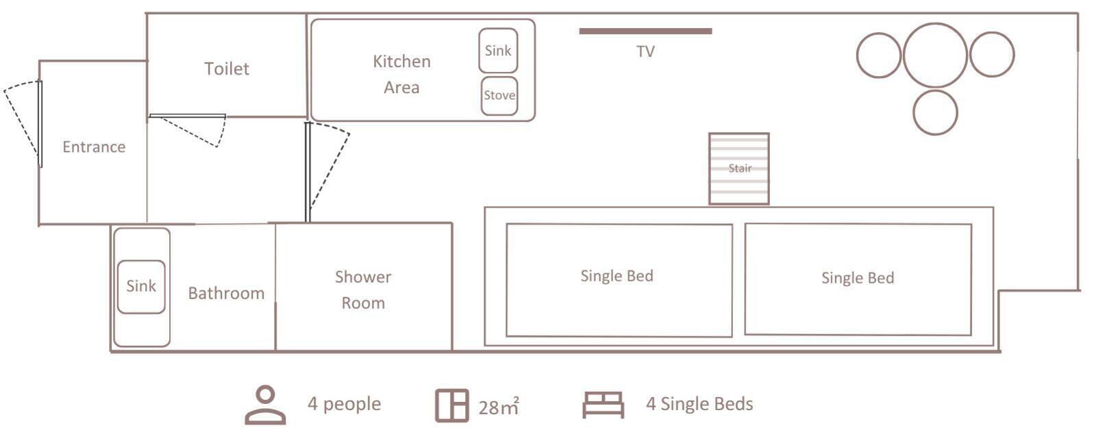 A floor plan with a bathroom, toilet, kitchen area, TV, and two single beds.