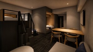 A compact room with a bunk bed, a small table with chairs, and a staircase. - Minn Hakata Station East (Fukuoka)