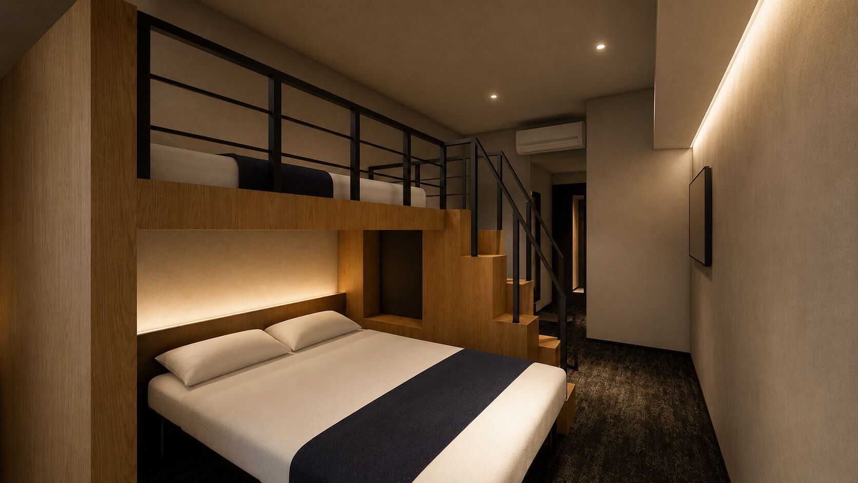A hotel room with a bunk bed, a desk, a chair, a small table, a lamp, and a window.