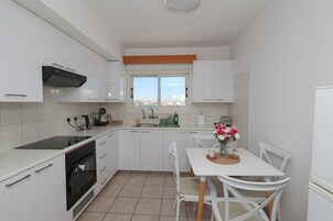 Apartamento, balcón | Cocina privada