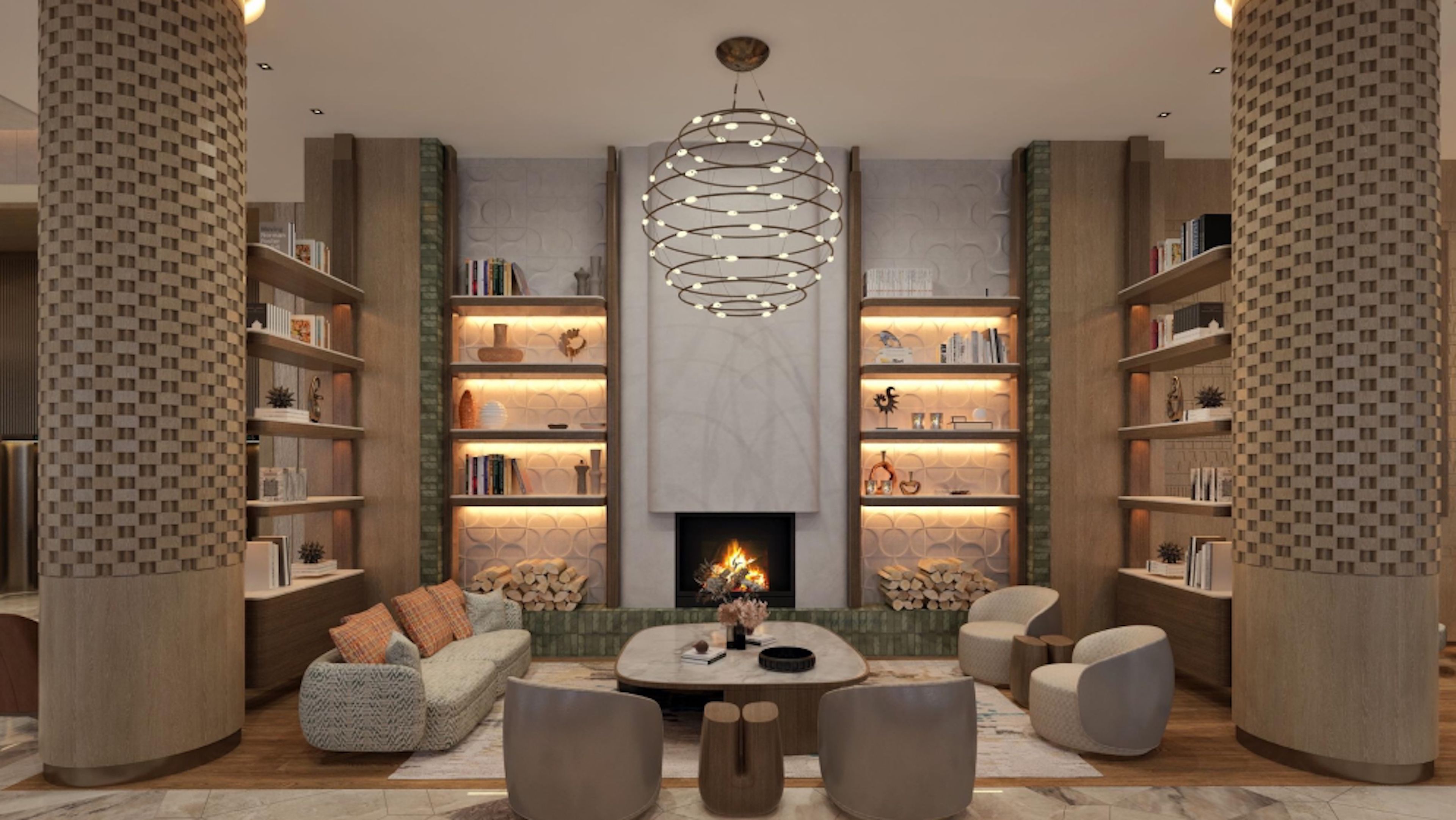 A modern living room with a fireplace, bookshelves, a sofa, and a coffee table.