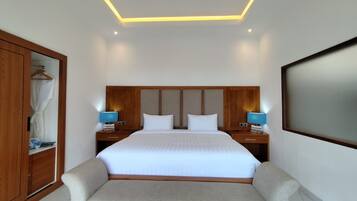 Habitación Deluxe con 1 cama doble o 2 individuales, vistas al jardín | Escritorio y wifi gratis