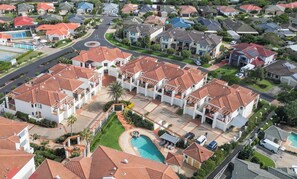 A residential area with multiple houses, a swimming pool, and a roundabout. - Elanora- Oceanstays- Breakers Pippi Beach (Yamba)
