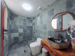 A bathroom with a shower, toilet, sink, and mirror. - Art Rice field Y Van Cac Homestay  (Hoa Lu)