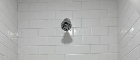 Shower, towels, soap, toilet paper