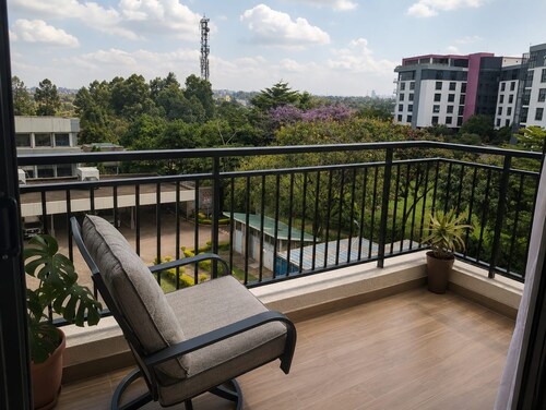Cozy 1-bedroom condo in soothing Nairobi with fitness room and Swimming pool