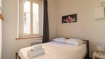 1 bedroom, laptop workspace, iron/ironing board, bed sheets