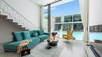 House, Balcony, Pool View | Living area | 32-inch Smart TV with digital channels