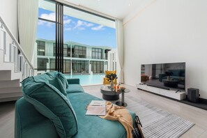 House, Balcony, Pool View | Living area | 32-inch Smart TV with digital channels - Pool Access Large Townhouse (Koh Samui)