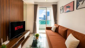Apartment, 2 Bedrooms, Sea View | Living area | 43-inch LED TV with digital channels