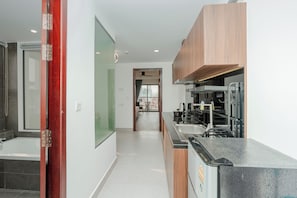 Executive Apartment, Balcony, City View | Private kitchen - Botum Domrey Hotel (Phnom Penh)