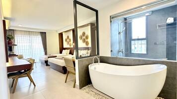 Family Twin Room | Bathroom | Hair dryer, towels, shampoo, toilet paper