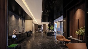A modern lobby with a reception desk, seating area, and a large open space. - Intercity Hotel Chengdu High tech Center (Chengdu)