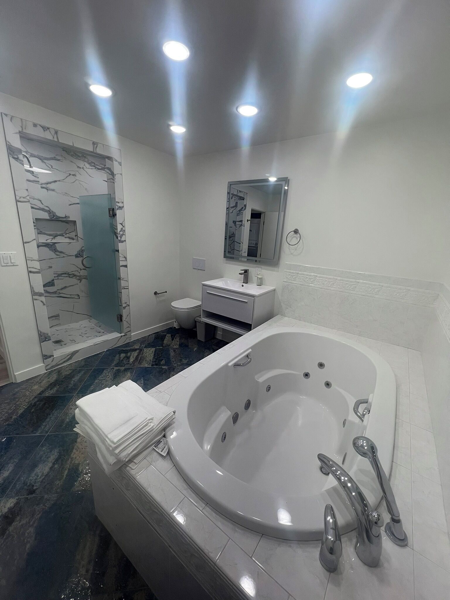 Jetted tub, hair dryer, towels, soap