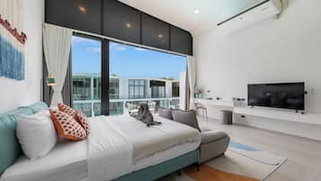 Townhome, Balcony, Pool View | Living area | 32-inch Smart TV with digital channels