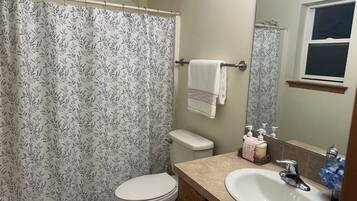 Hair dryer, towels, soap, toilet paper