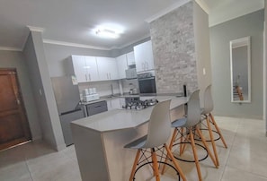 Fridge, microwave, oven, stovetop - Coastal Chic in the Heart of Ballito  3-Bed Oasis (Ballito)