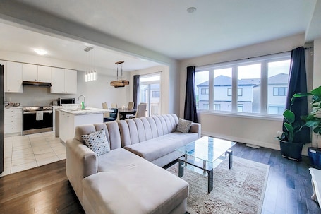 Living area. Spacious 4-bedroom house with AC in welcoming Caledonia
