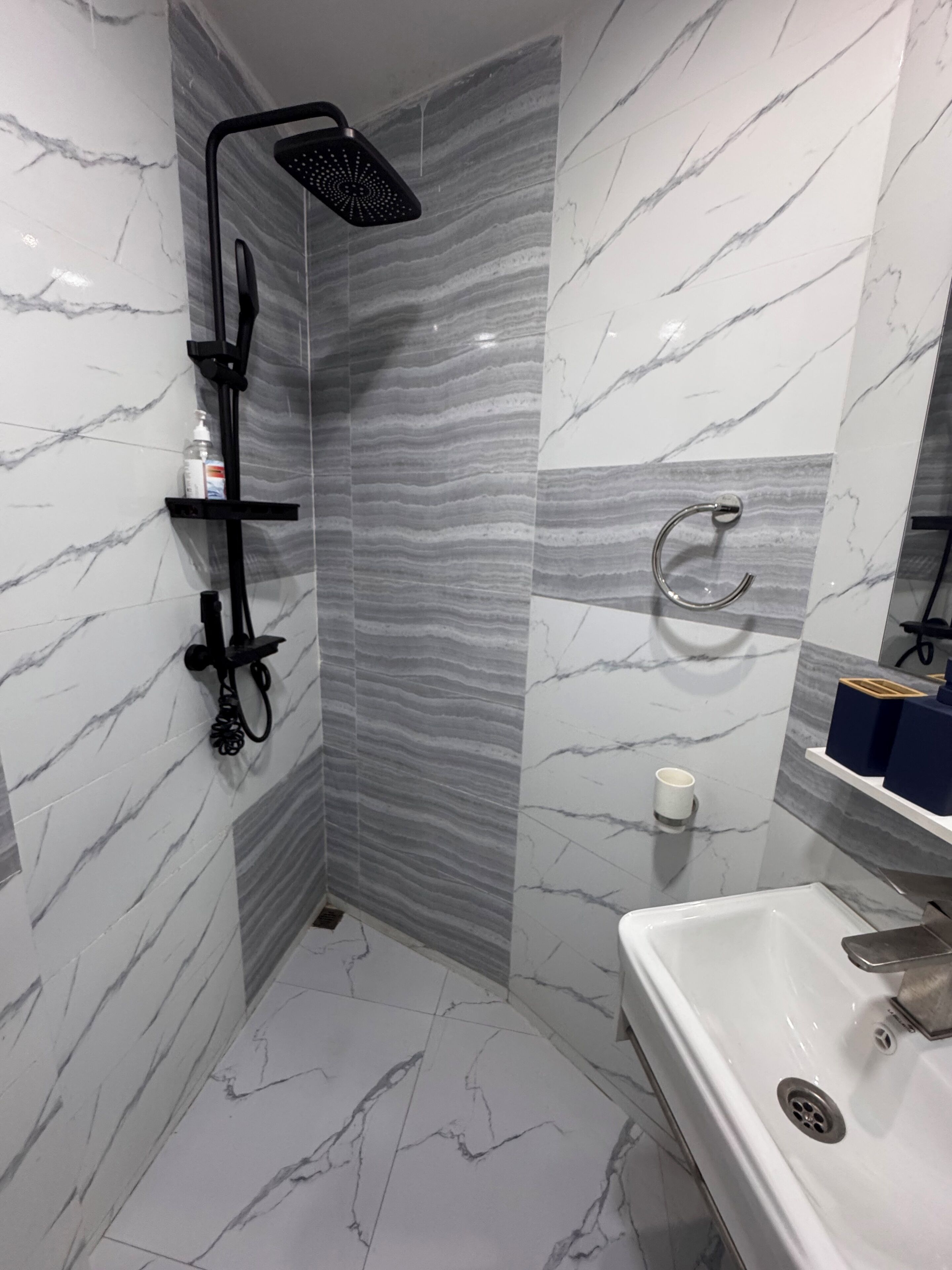 Shower, towels, soap, toilet paper