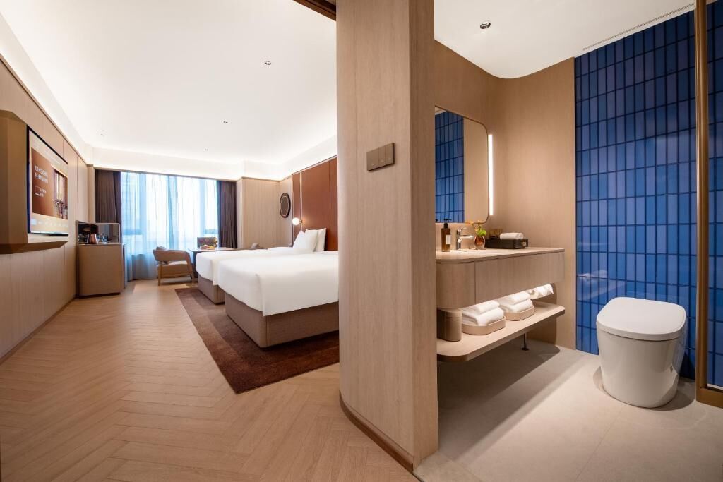Twin Room, City View | Desk, blackout curtains, iron/ironing board