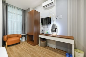 Quarto casal premier, vista para a cidade | Wi-Fi de cortesia, roupa de cama