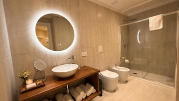 Luxury Quadruple Room, City View | Bathroom | Shower, hair dryer, towels, soap