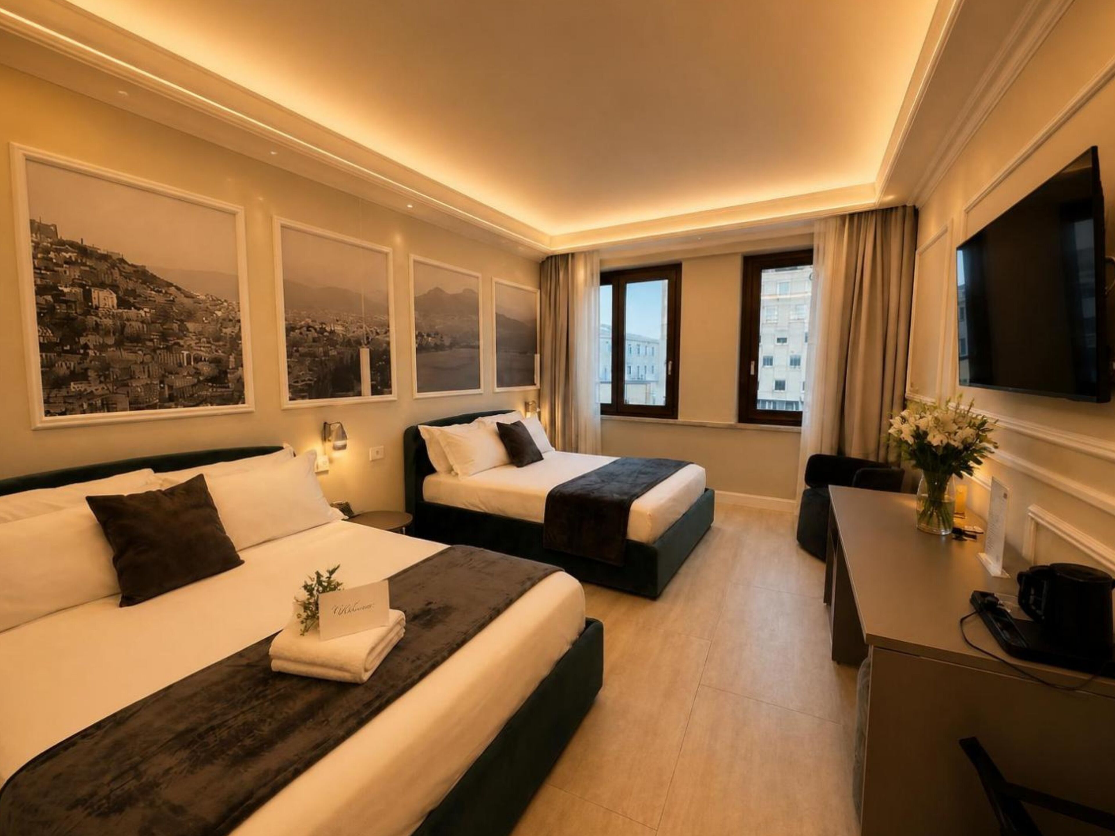 Luxury Quadruple Room, City View | Minibar, in-room safe, desk, laptop workspace