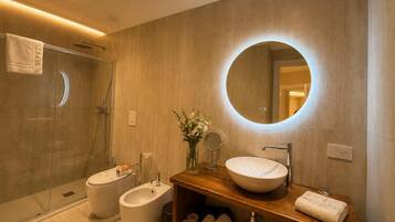 Luxury Quadruple Room, City View | Bathroom | Shower, hair dryer, towels, soap