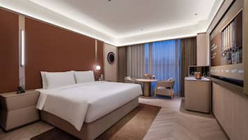 Premium bedding, down duvets, Select Comfort beds, free minibar