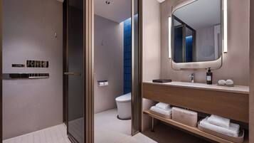 Basic Single Room | Bathroom | Shower, hair dryer, slippers, towels