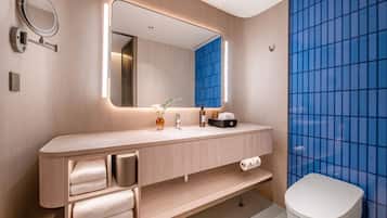 Premium bedding, memory foam beds, free minibar, desk