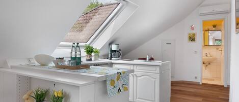 Fridge, stovetop, coffee/tea maker, electric kettle