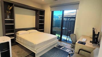 1 bedroom, desk, iron/ironing board, travel crib