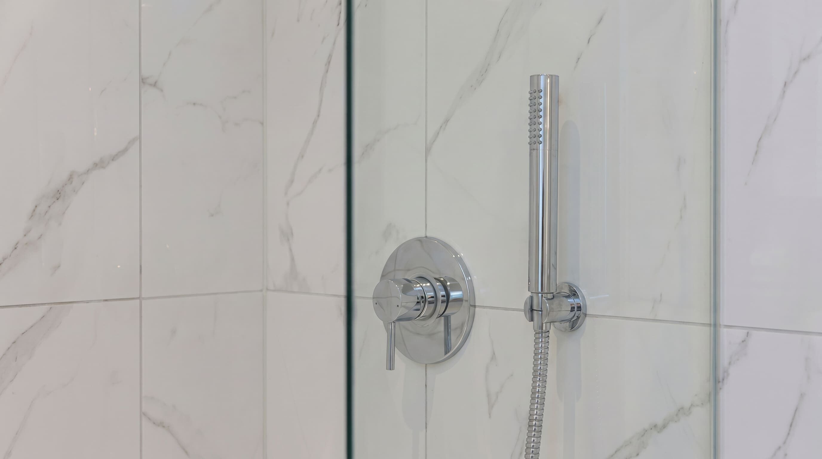 Shower, hair dryer, towels, shampoo