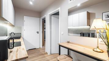 Apartment | Private kitchen | Fridge, stovetop, cookware/dishes/utensils