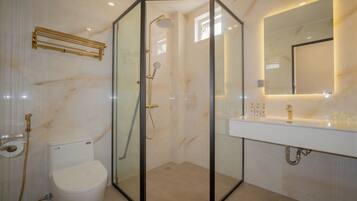 Shower, hair dryer, towels, soap