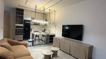 Deluxe Apartment, Balcony, City View | Living area