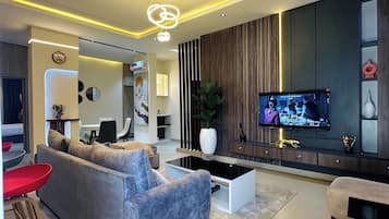 Deluxe Apartment, Balcony, City View | Living area